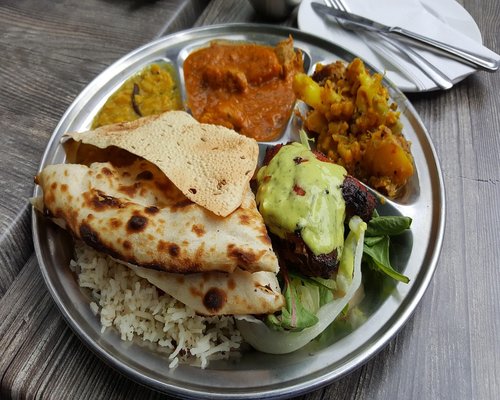 Traditional Indian thali with dal roti and vegetables