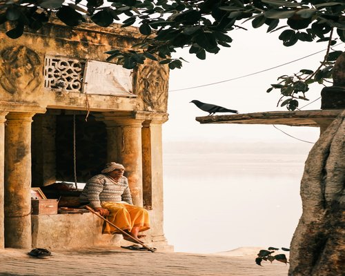 Person working on laptop from home in India
